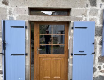 Porte pvc avec 1/2 panneau euradif + 1 fixe latéral